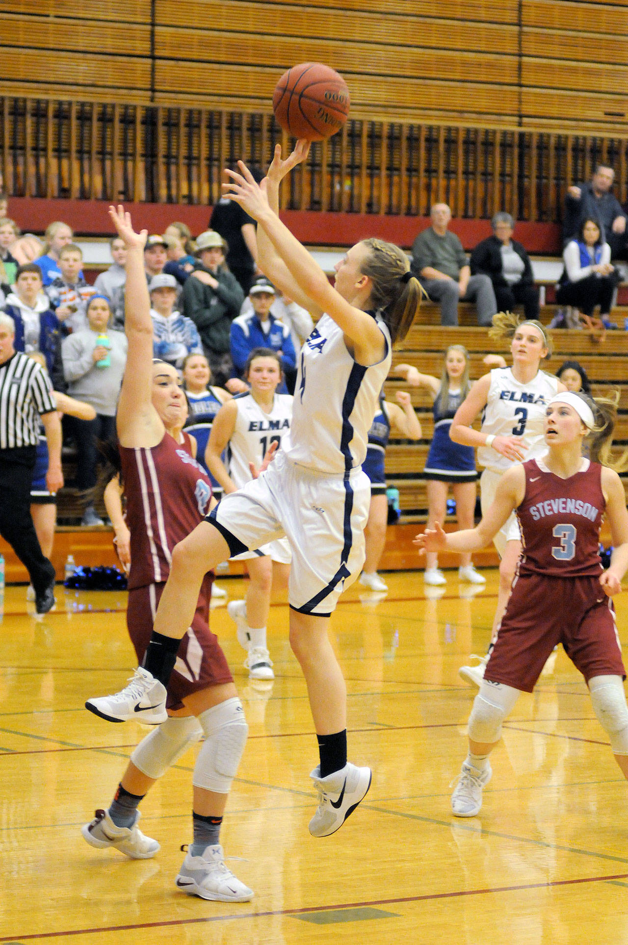 Elma’s Jillian Bieker floats through the lane during the second half of the Eagles’ 73-40 district-semifinal victory over Stevenson on Friday at Hoquiam High School. (Ryan Sparks | Grays Harbor News Group)