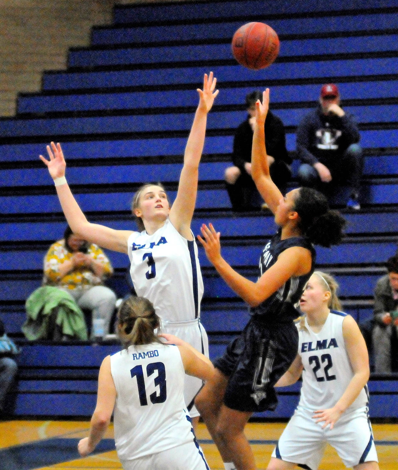 Elma’s Jalyn Sackrider, left, defends a shot from King’s Way Christian’s Mackenzie Ellerston in a game on Saturday. (Hasani Grayson | Grays Harbor News Group)