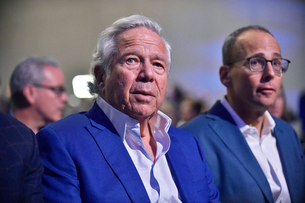 New England Patriots owner Robert Kraft has been accused of soliciting sex, police say. Kraft is being charged with two counts of soliciting someone to commit prostitution, stemming from a raid in a day spa in Florida, police said Friday. PICTURED: New England Patriots owner Robert Kraft listens to NFL Commissioner Roger Goodell speak to the media over various topics in the league leading up to Super Bowl LIII at the Georgia World Congress Center on January 30, 2019, in Atlanta, GA. (Austin Mcafee/Icon SMI via ZUMA Press)