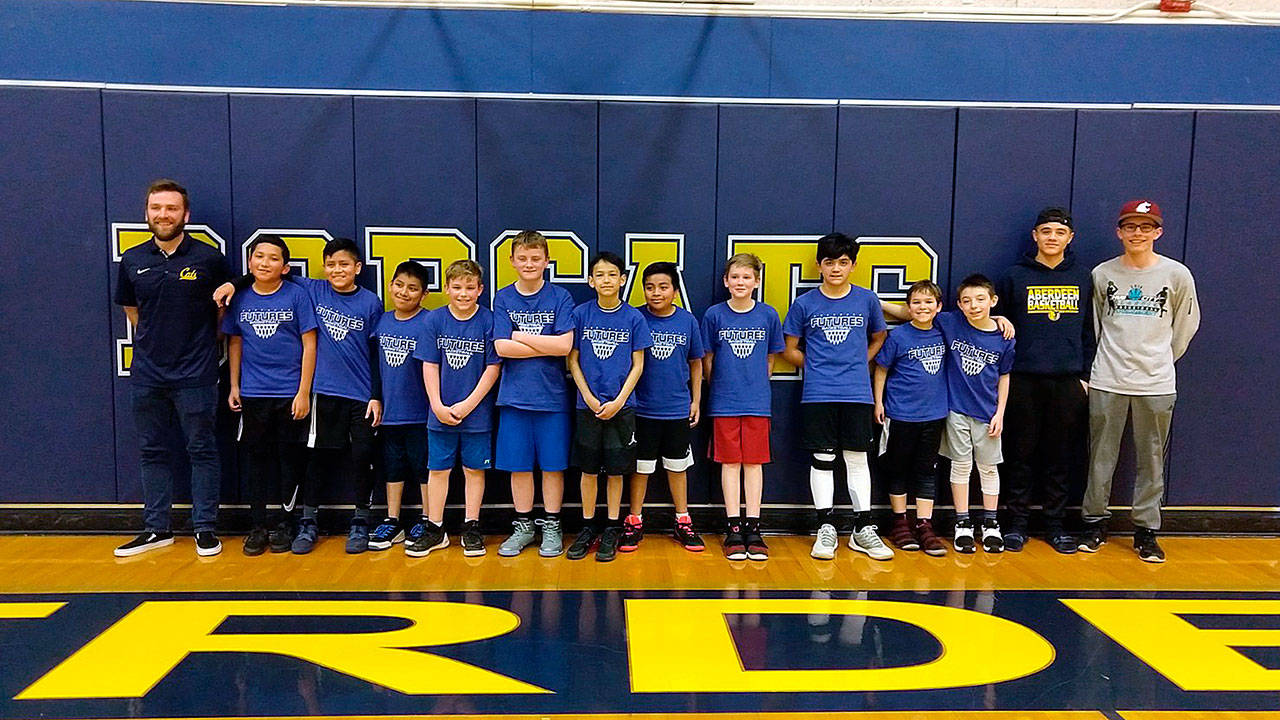 The Robert Gray Blue won a 5th/6th grade basketball tournament Saturday at Aberdeen High School. Pictured from left are: Coach Kingery, Antonio Aguilar, Jonathan Ordonez, Jaime Martinez De Jesus, Calvin Reed, Jayden Gladson, Maurico Figueroa Palacio, Anthony Juarez-Paxtor, Ryan Williams, Tony Hatlestad, Treven Ramos, Kaiden Plemmons, Coach Ford and Coach King. (Submitted photo)