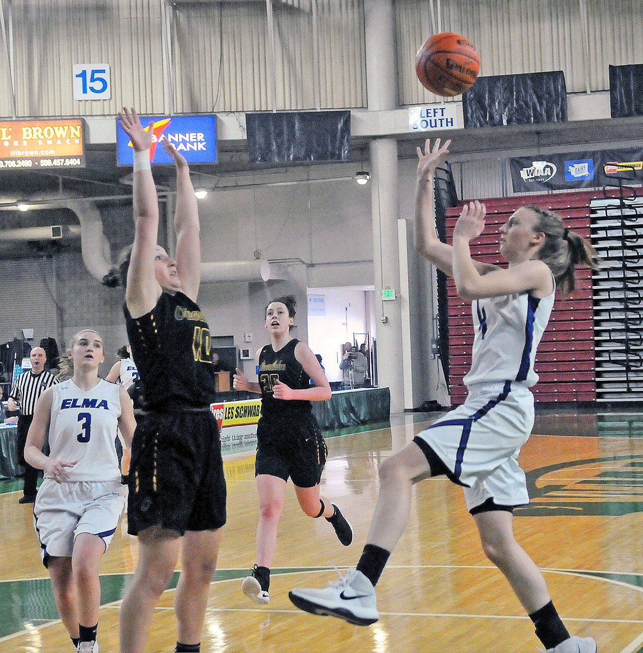 Elma’s Jillian Bieker hits a floater in the first quarter against Overlake. (Hasani Grayson | Grays Harbor News Group)