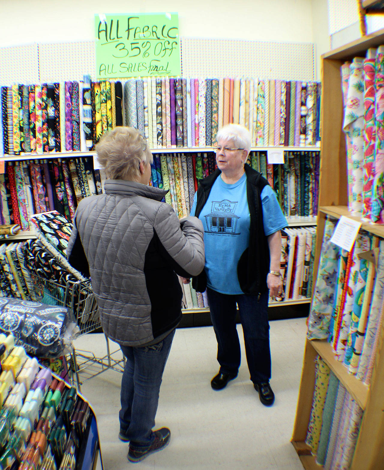 (Michael Lang | Grays Harbor News Group) Carol Morrow chats with a customer at the Elma Variety Store.