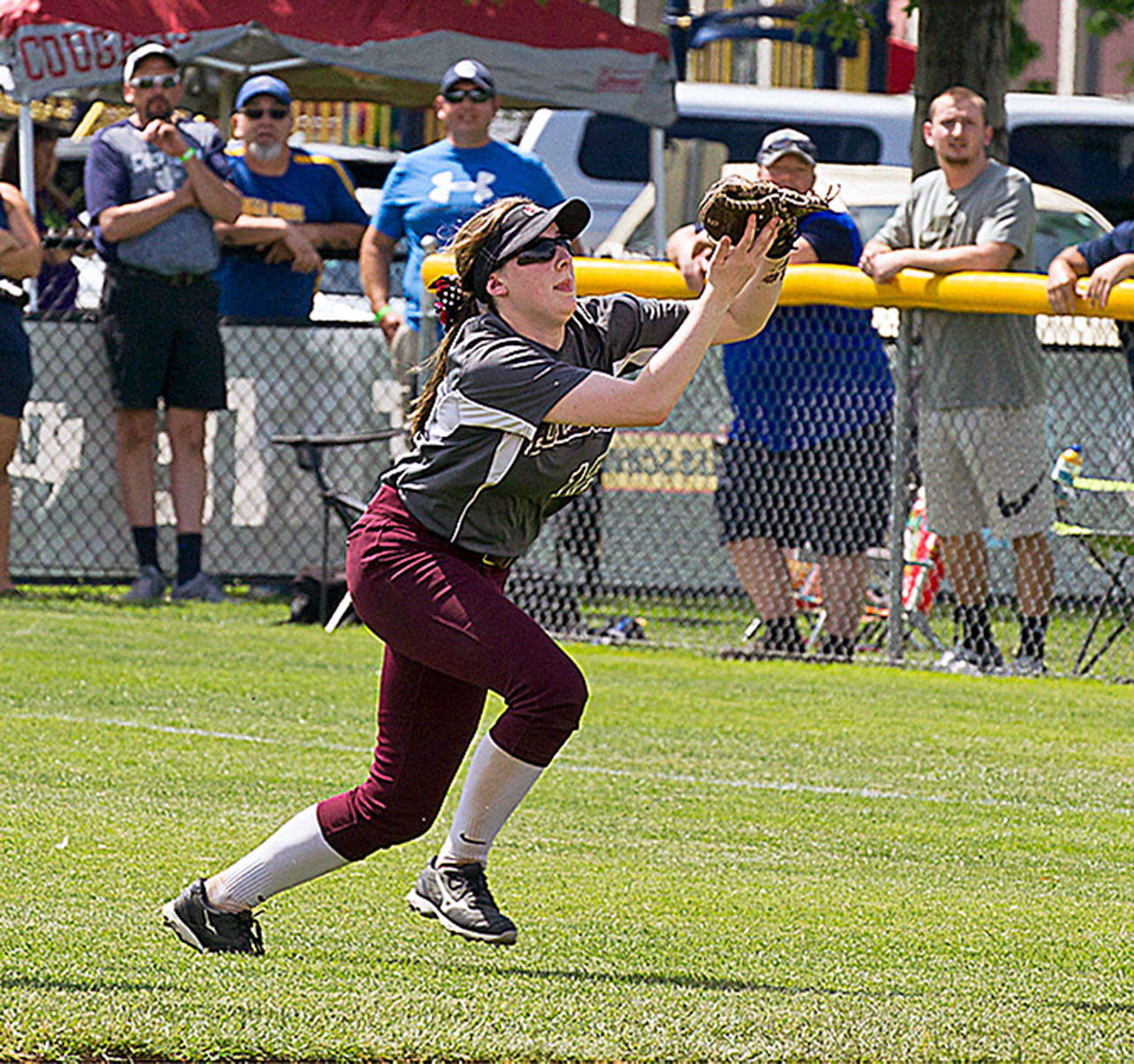 Montesano infielder Lexi Lovell makes a running catch during the 1A State Tournament last season. The Bulldogs return a core group of players that possess a state-championship pedigree. (Photo by Shawn Donnelly)