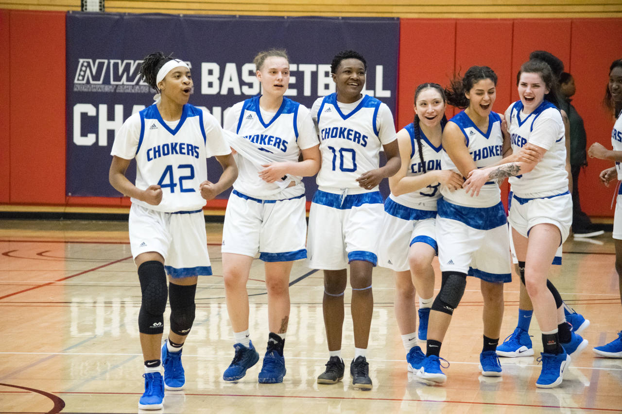 The Grays Harbor women’s basketball team celebrates after their defeat of Whatcom Community College in the Sweet Sixteen of the NWAC Women’s Basketball Championship tournament in Everett, Wash. on Saturday, March 9. (Katie Webber | The Herald)