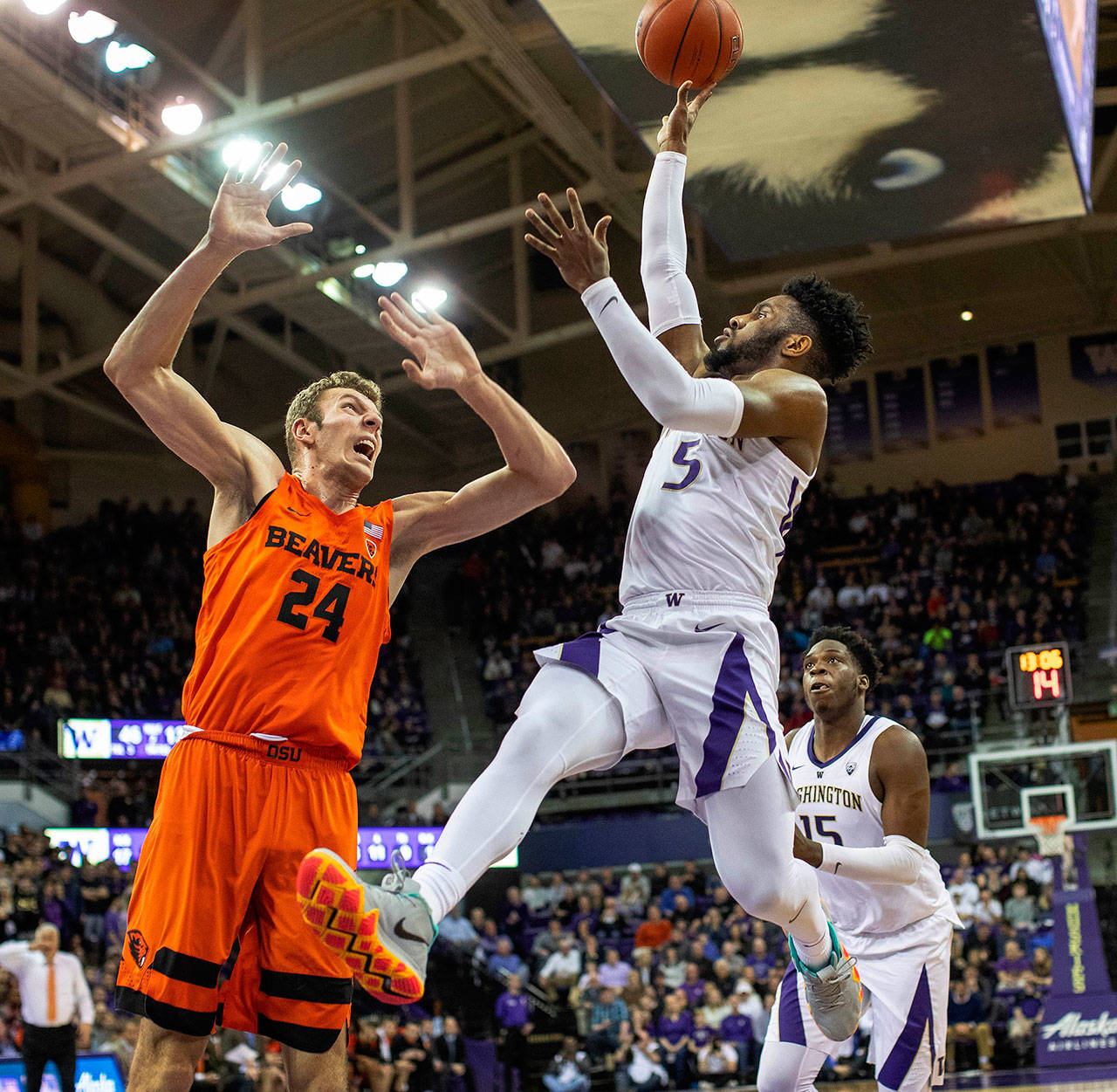 Washington’s Jaylen Nowell puts up a shot over Oregon State’s Kylor Kelley in the second half, giving the Huskies a 48-46 lead over the Beavers with 13:02 to play on Wednesday, March 6, 2019 at Alaska Airlines Arena in Seattle, Wash. (Dean Rutz/Seattle Times/TNS)