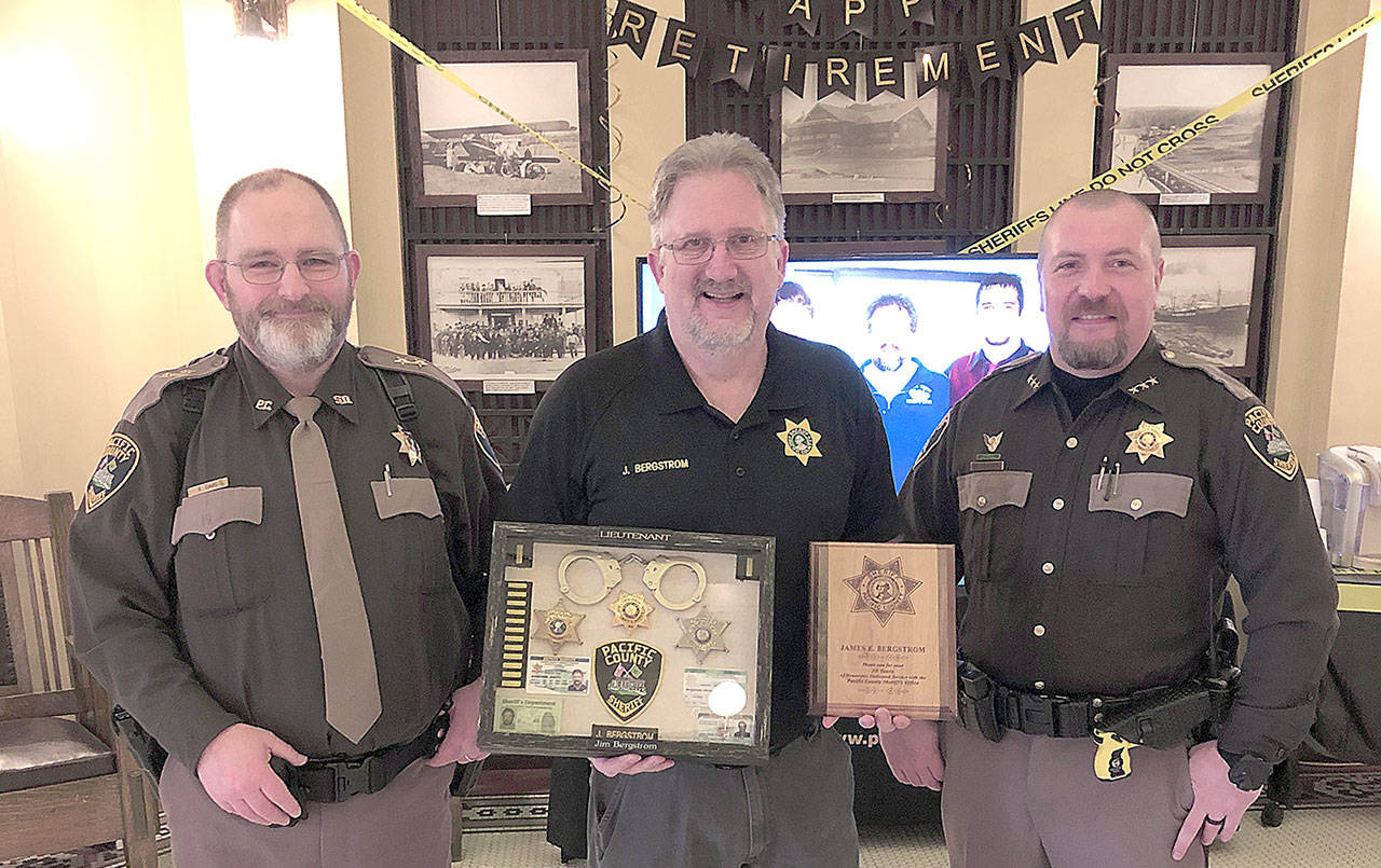 COURTESY PACIFIC COUNTY SHERIFFS OFFICE                                 Lt. Jim Bergstrom, center, retired from the Pacific County Sheriffs Office Feb. 28. His long career in law enforcement has not come to an end; he has accepted the position of chief of the Shoalwater Bay Tribal Police. With him are Pacific County Undersheriff Ron Davis, left, and Sheriff Robin Souvenir.