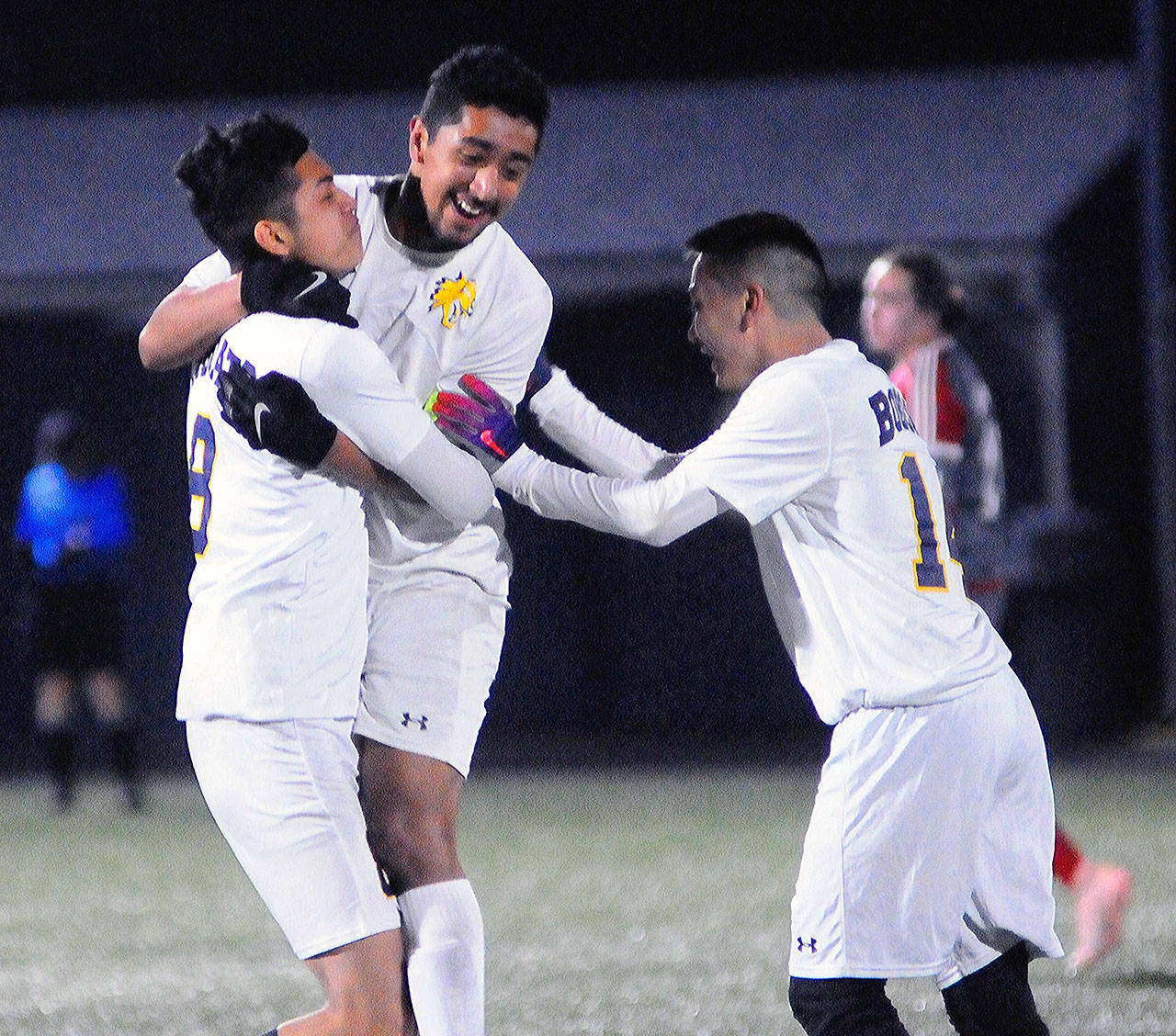 Aberdeen’s Hulizes Chavez, middle, celebrates with teammates Christian Sanchez, right, and Miguel Martinez after Chavez’s goal in the 53rd minute. (Hasani Grayson | Grays Harbor News Group)