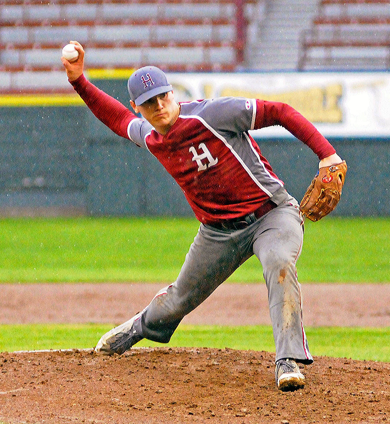 Hoquiam’s Payton Quintanilla delivers a pitch in the second inning against Forks. Quintanilla pitched 6 2/3 innings in the Grizzlies’ 6-5 win over the Spartans on Wednesday. (Hasani Grayson | Grays Harbor News Group)