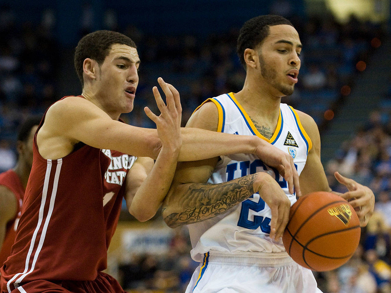 UCLA’s Tyler Honeycutt battles for a loose ball with Washington State’s Klay Thompson, left, during the first half at Pauley Pavilion in Los Angeles, California, on Wednesday, December 29, 2010. (Kevin Sullivan/Orange County Register/MCT)