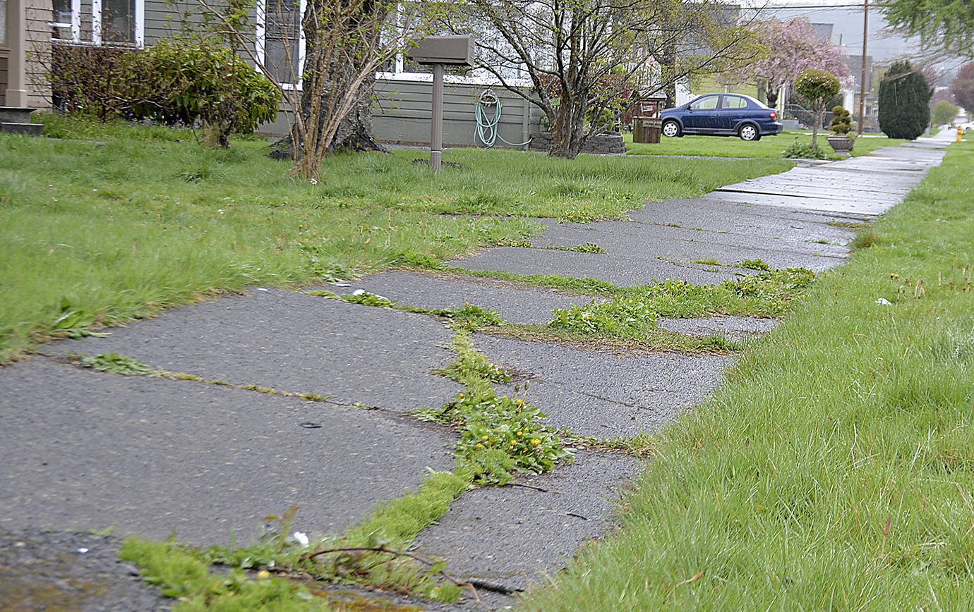 DAN HAMMOCK | GRAYS HARBOR NEWS GROUP A program where Hoquiam residents can split the cost of sidewalk repairs with the city got a financial boost earlier this month, an $18,000 grant to pay for the cost of seasonal laborers.