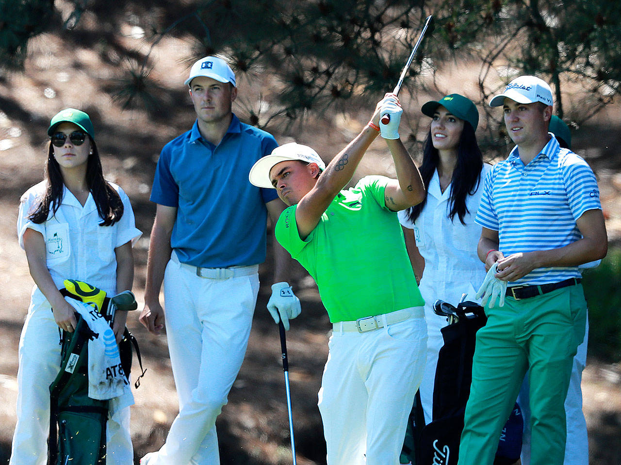 Jordan Spieth (left), Rickie Fowler (middle), and Justin Thomas tee off on the fourth hole during the Masters Par -3 Contest at Augusta National Golf Club on Wednesday, April 10, 2019, in Augusta, Ga. (Curtis Compton/Atlanta Journal-Constitution/TNS)