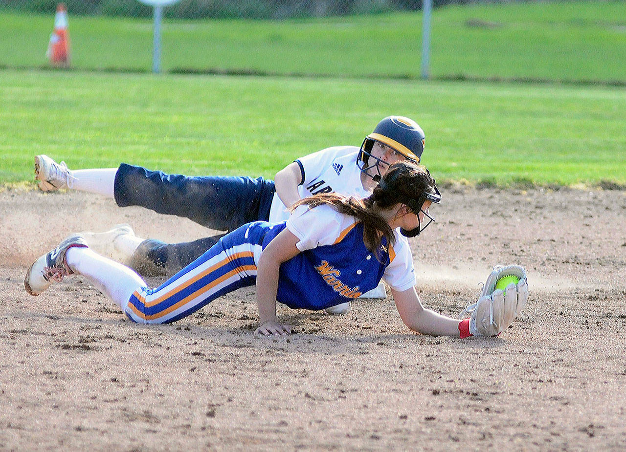 Randi Stewart steals second base in the sixth inning of a game against Rochester. Stewart later came around to score the game-tying run in the Bobcat’s 3-2 win over the Warriors on Friday. (Hasani Grayson | Grays Harbor News Group)