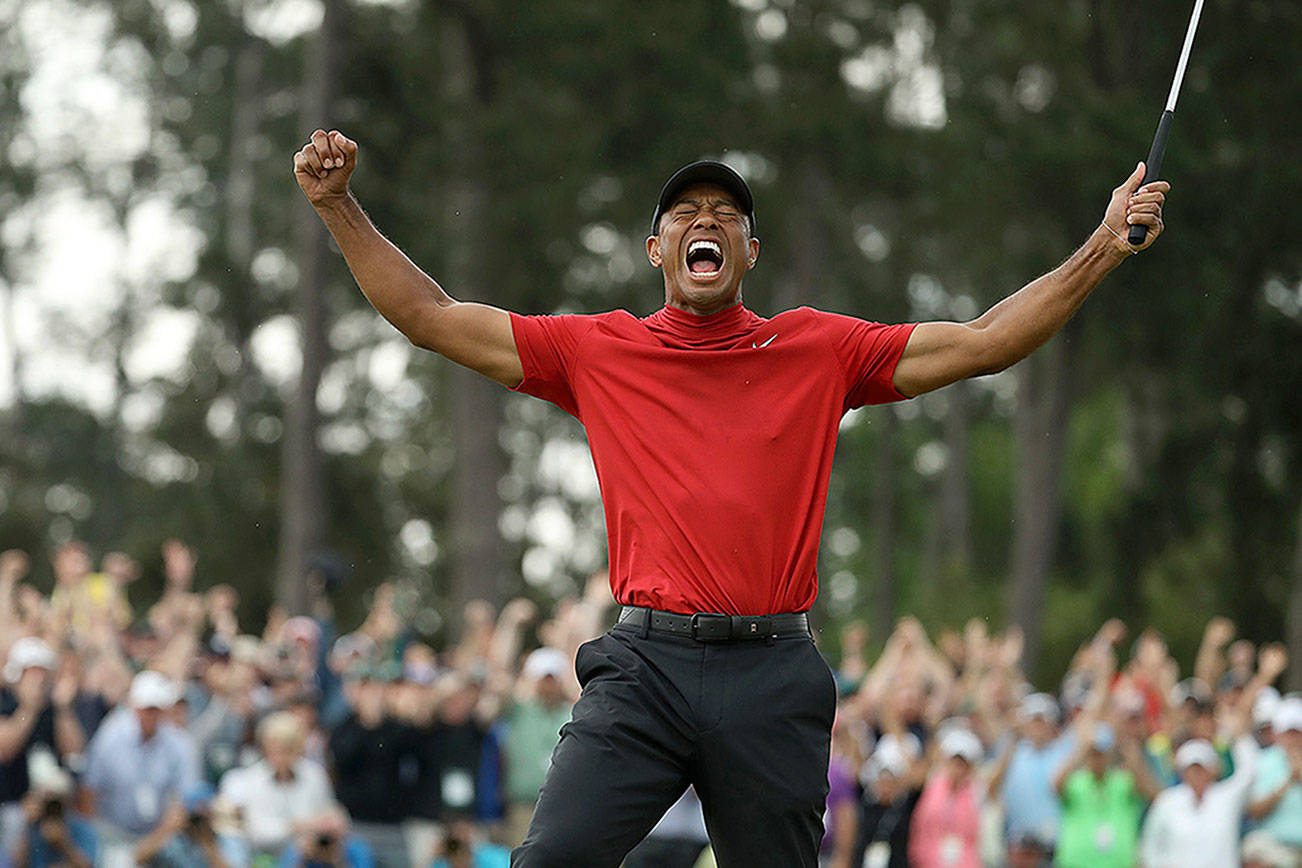 Thinking of his dad, Woods notches a Masters victory that his children will remember