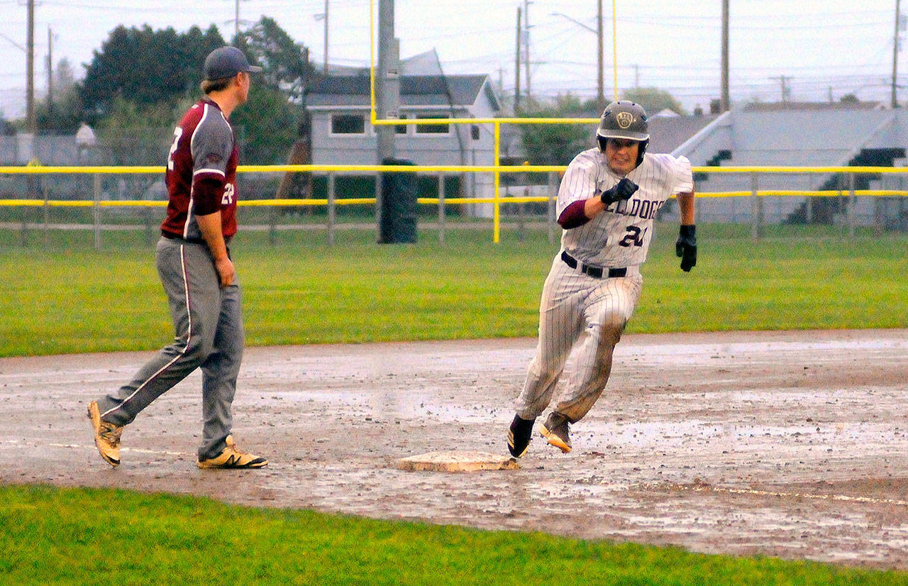 Montesano’s Payson Parker rounds third to score in the sixth inning against Hoquiam on Tuesday. (Hasani Grayson | Grays Harbor News Group)