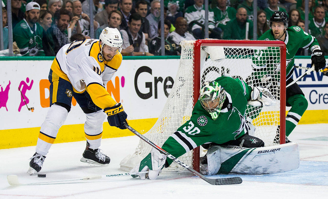Dallas Stars goaltender Ben Bishop (30) stops a shot by Nashville Predators center Colton Sissons (10) during the second period of Game 6 of the first round of Stanley Cup Playoffs between the Dallas Stars and the Nashville Predators on Monday, April 22, 2019 at American Airlines Center in Dallas. (Ashley Landis/The Dallas Morning News/TNS)