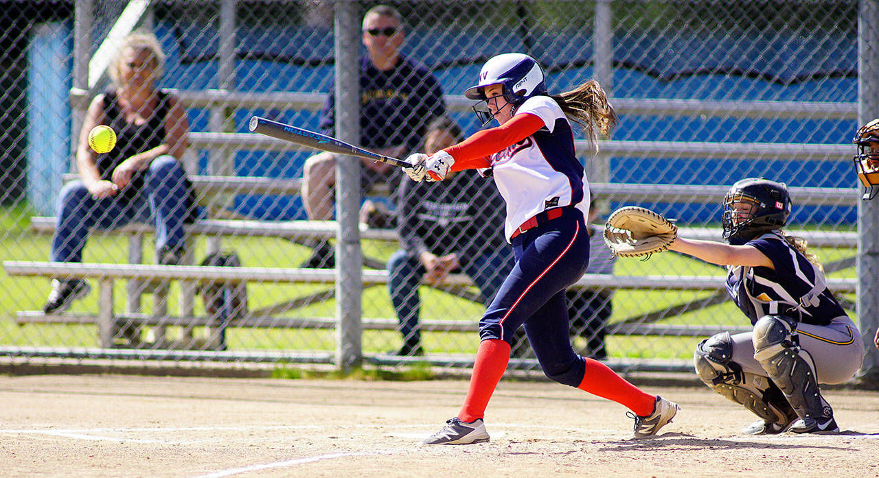 Robert Hilson | The Chronicle                                PWV catcher Grace Hodel drives a pitch to left-centerfield for an inside-the-park grand slam home run against Ilwaco on Tuesday.