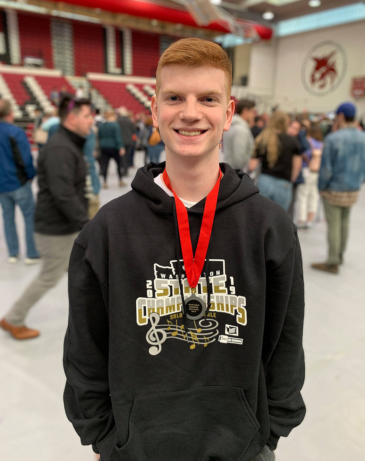Courtesy Joe Fagerstedt                                Ben Fagerstedt stands with his second place medal in the baritone division of the WIAA competition this past weekend.