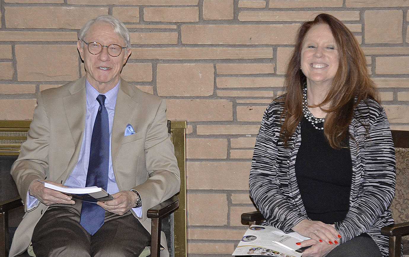 DAN HAMMOCK | GRAYS HARBOR NEWS GROUP                                State Historian John Hughes and Secretary of State Kim Wyman share a laugh before speaking at the Channel Point Village retirement community in Hoquiam Thursday.