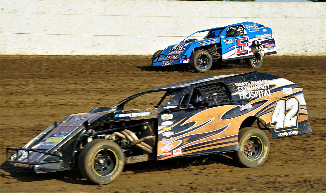 Kevin Hanson (42) races against Devan West in the Washington Modifieds Tour on Saturday at Grays Harbor Raceway in Elma. (Photo by AR Racing Videos)