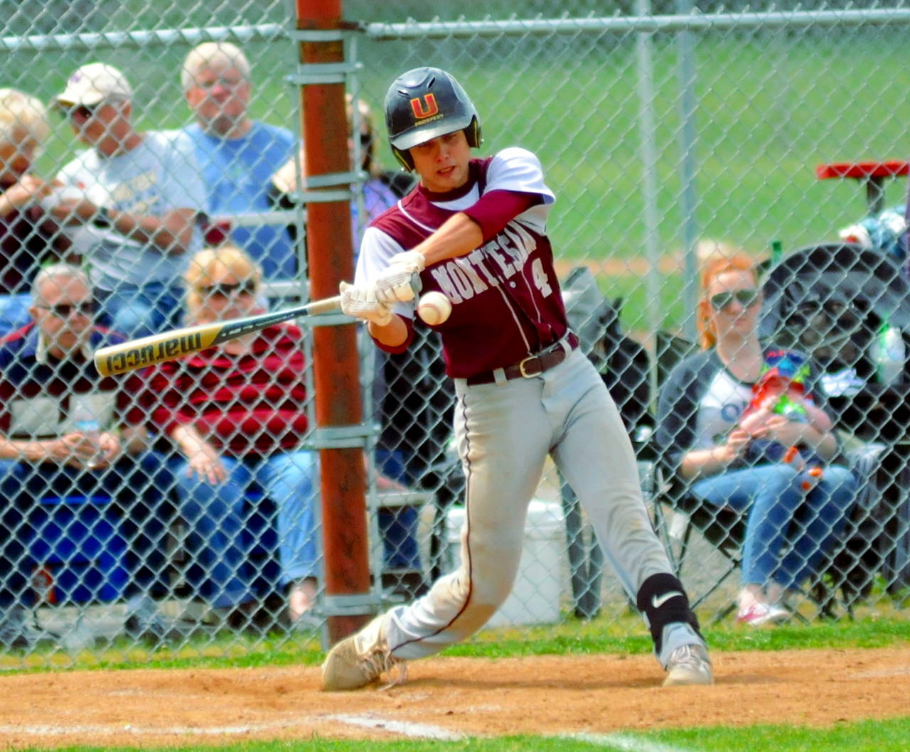 Montesano outfielder Aaron Lano laces a two-run double during the Bulldogs’ 4-3 loss to Seattle Christian in the 1A Regional Final on Saturday at Castle Rock High School. (Ryan Sparks | Grays Harbor News Group)