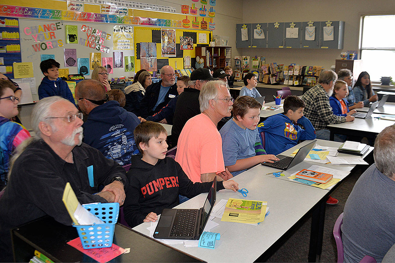 Fourth-grade students play a trivia game during Grandparents Day at Central Park Elementary.