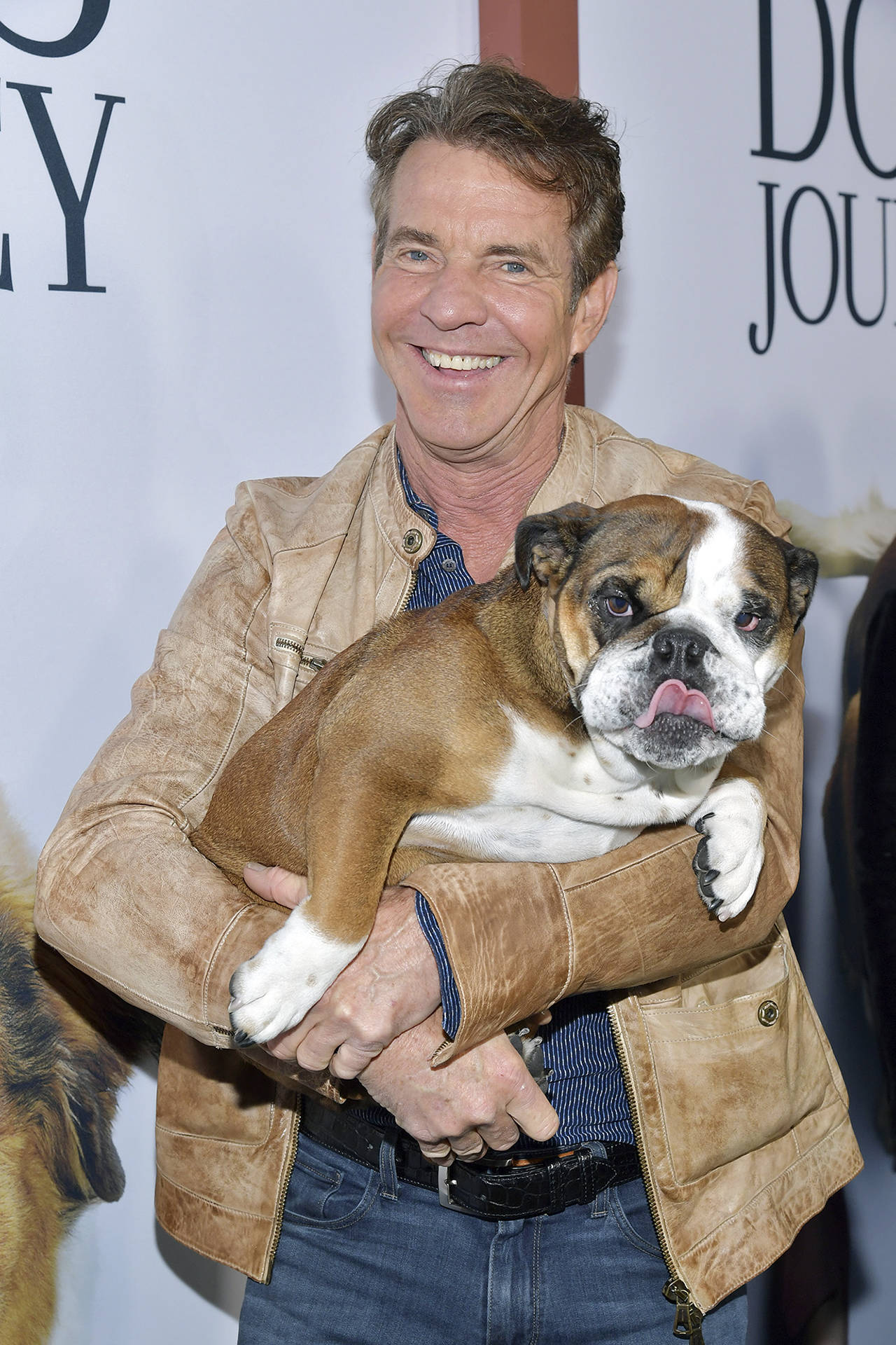 Amy Sussman | Getty Images                                Dennis Quaid and Peaches attend the premiere of Universal Pictures A Dogs Journey at ArcLight Hollywood on May 9.