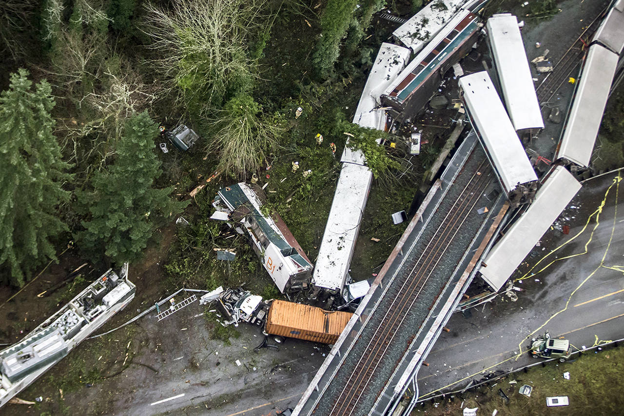 Bettina Hansen | Seattle Times                                Amtrak Cascades 501 derailed and fell off a bridge onto Interstate 5 on Dec. 18, 2017.