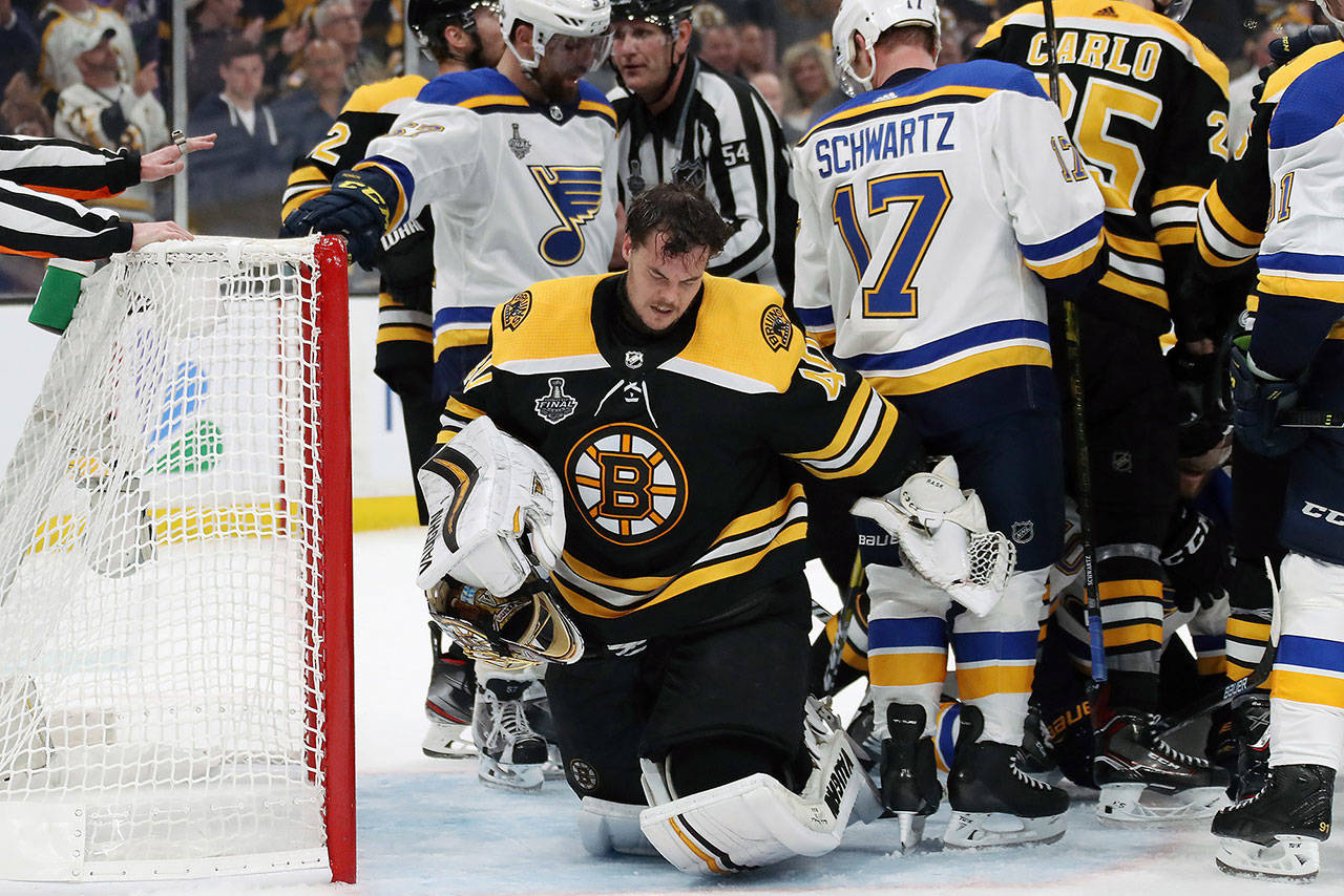 Tuukka Rask of the Boston Bruins reacts after his helmet is knocked off following his teams 4-2 win over the St. Louis Blues in Game One of the 2019 NHL Stanley Cup Final at TD Garden on Monday. The Bruins won, 4-2. (Bruce Bennett | Getty Images/TNS)