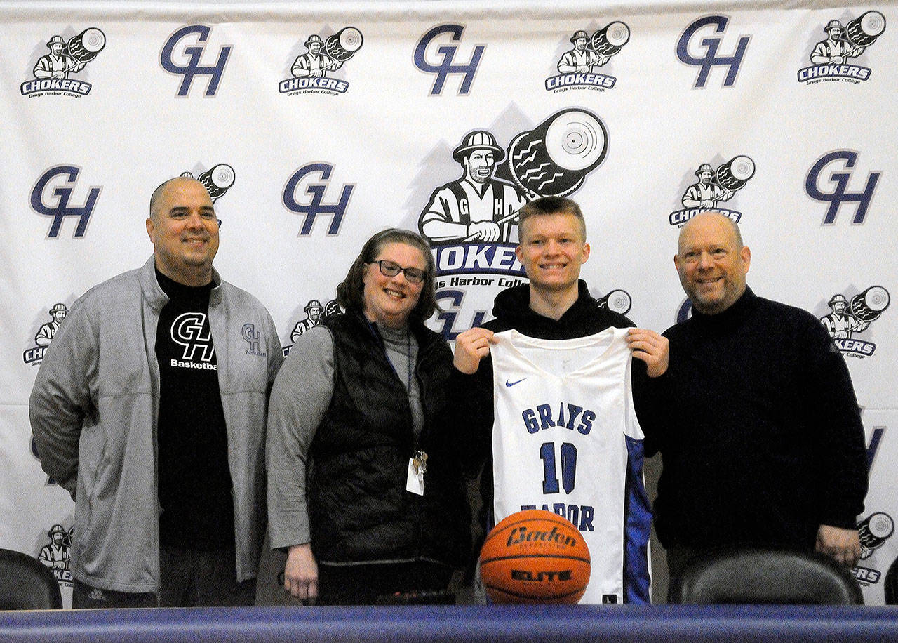 Aberdeen point guard Ben Dublanko is surrounded by family after signing a National Letter of Intent to play basketball for Grays Harbor College. Dublanko said part of what attracted him to Grays Harbor College was the chance to be a part of the positive changes the basketball program hopes to make. This is home. Coach Vargas is doing awesome things to get this program turned around, he said. Ill be able to stay in this community and help try to change this program and send it in the right direction. Its a great opportunity for me to get better. Pictured from left: Grays Harbor mens basketball coach Matt Vargas, Kristen Dublanko (mother), Ben Dublanko and Craig Dublanko (father). (Submitted photo)