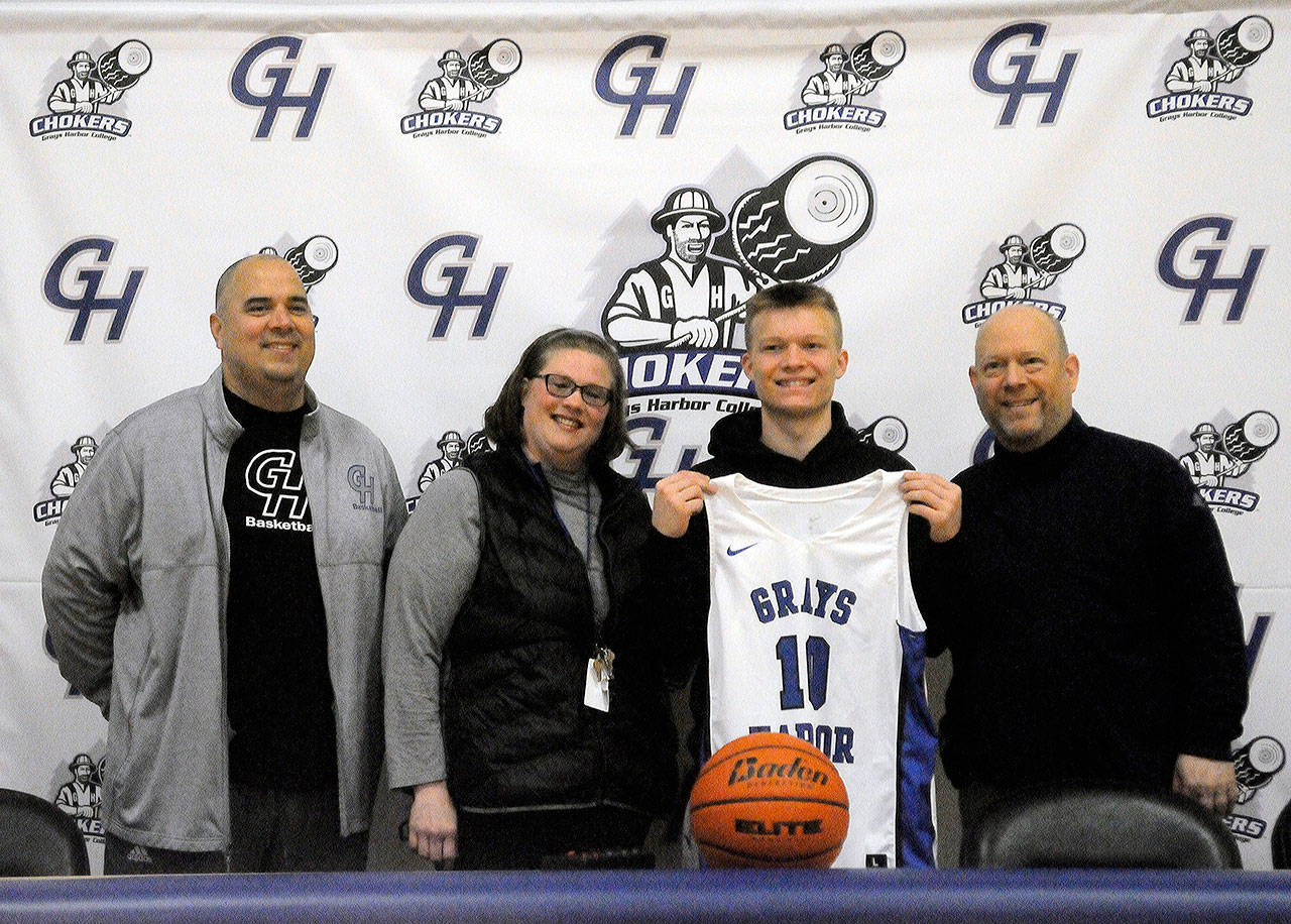 Aberdeen point guard Ben Dublanko is surrounded by family after signing a National Letter of Intent to play basketball for Grays Harbor College. Dublanko said part of what attracted him to Grays Harbor College was the chance to be a part of the positive changes the basketball program hopes to make. “This is home. Coach Vargas is doing awesome things to get this program turned around,” he said. “I’ll be able to stay in this community and help try to change this program and send it in the right direction. It’s a great opportunity for me to get better.” Pictured from left: Grays Harbor men’s basketball coach Matt Vargas, Kristen Dublanko (mother), Ben Dublanko and Craig Dublanko (father). (Submitted photo)