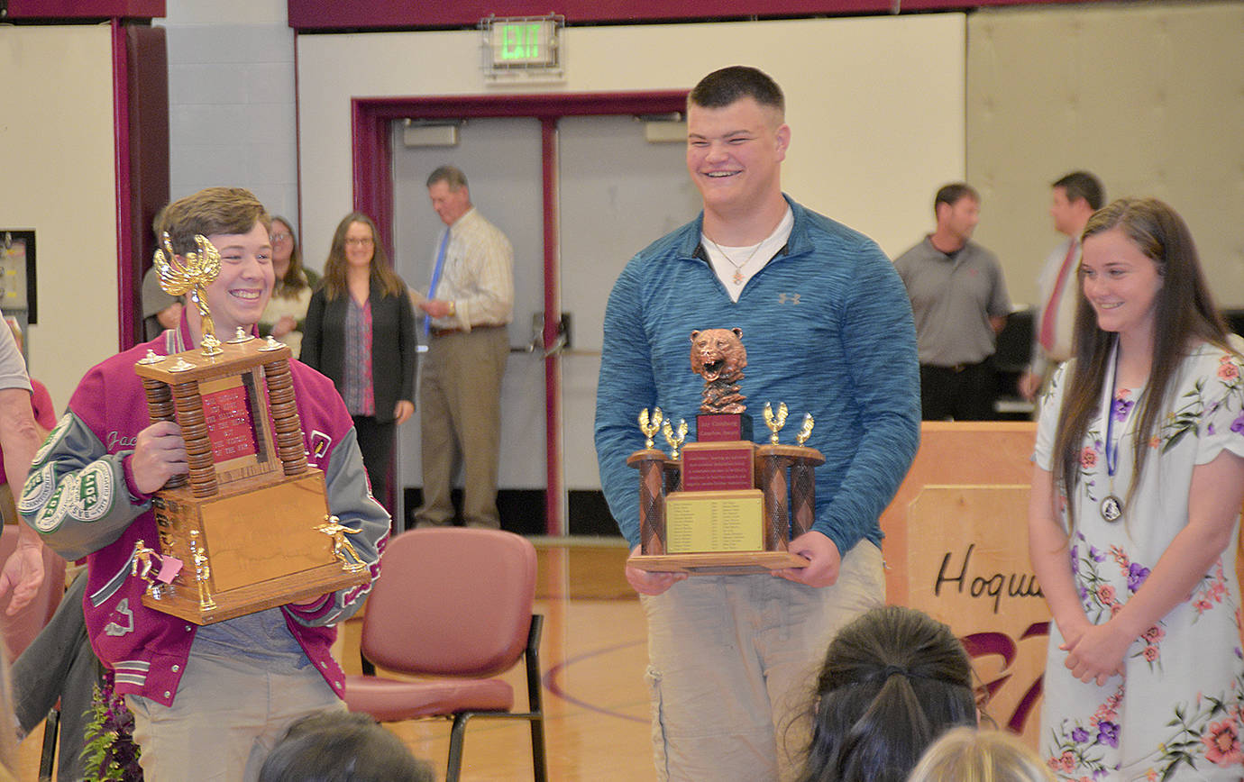 DAN HAMMOCK | GRAYS HARBOR NEWS GROUP                                Hoquiam High School Class of 2019 sports awards recipients included Jackson Folkers, left, with the Elmer Huhta Most Outstanding Athlete Award, and Caleb Larsen and ReyLynn Dunn with the Jay Goldberg Coaches Awards.