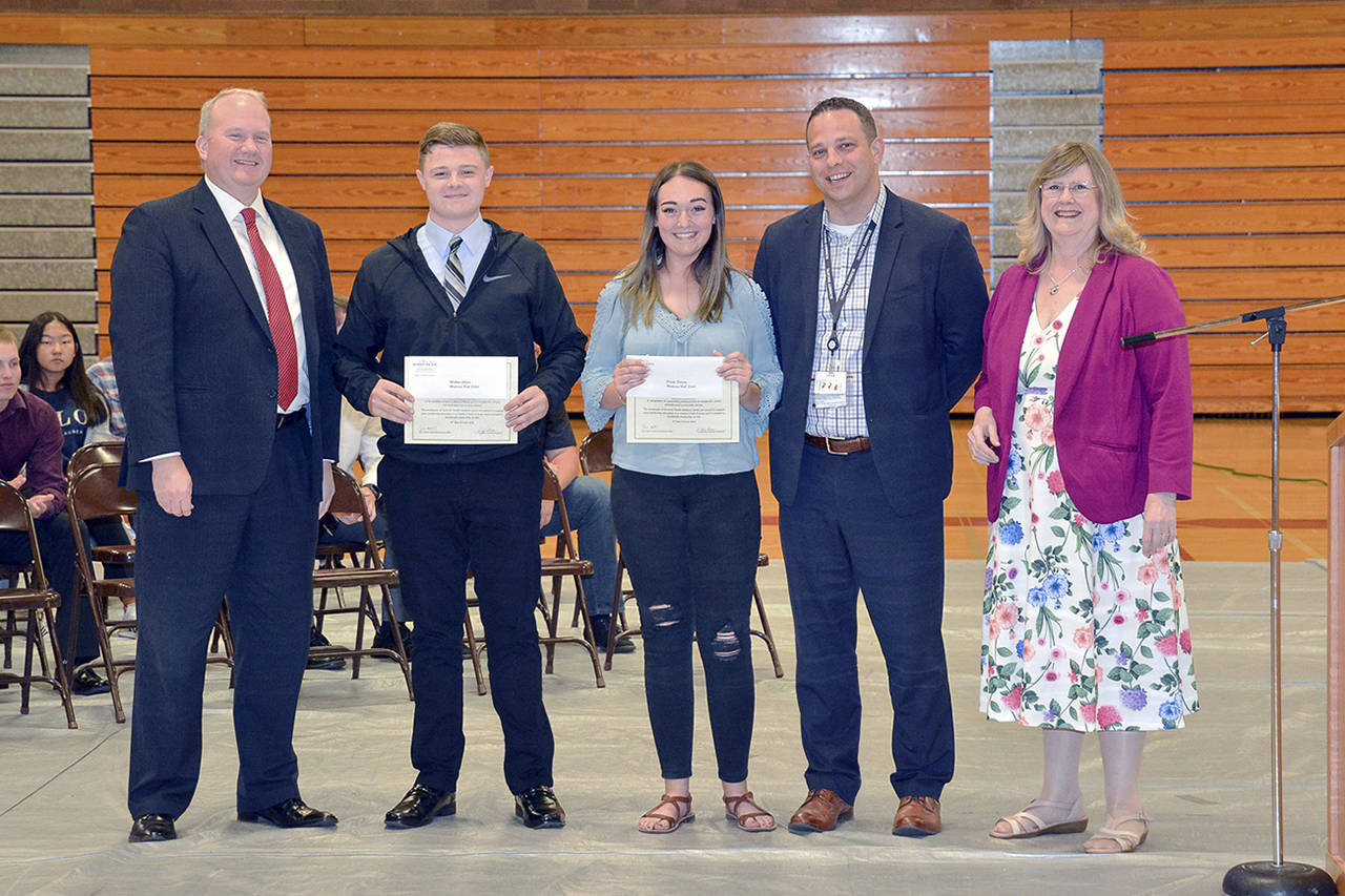 Courtesy photo                                From left are John Elsner, executive director of Summit Pacific Medical Foundation; Montesano High School recipients Matthew Johnson and Danika Peterson; Summit CEO Josh Martin; and Scholarship Committee Chair Joy Iversen.