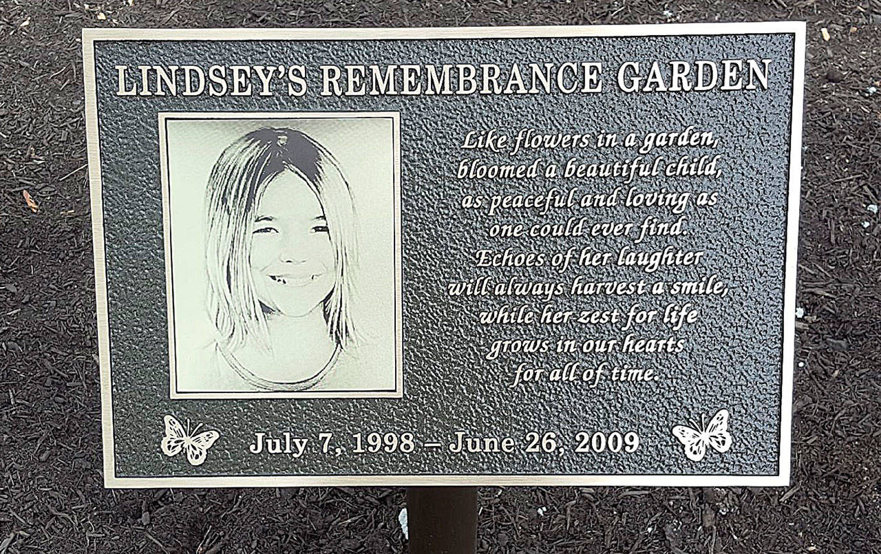 COURTESY MICHELLE AMES                                A plaque was installed Wednesday at the Lindsey Baum memorial garden in McCleary. The garden will be dedicated at 7 p.m. June 26, the 10-year mark of her disappearance.