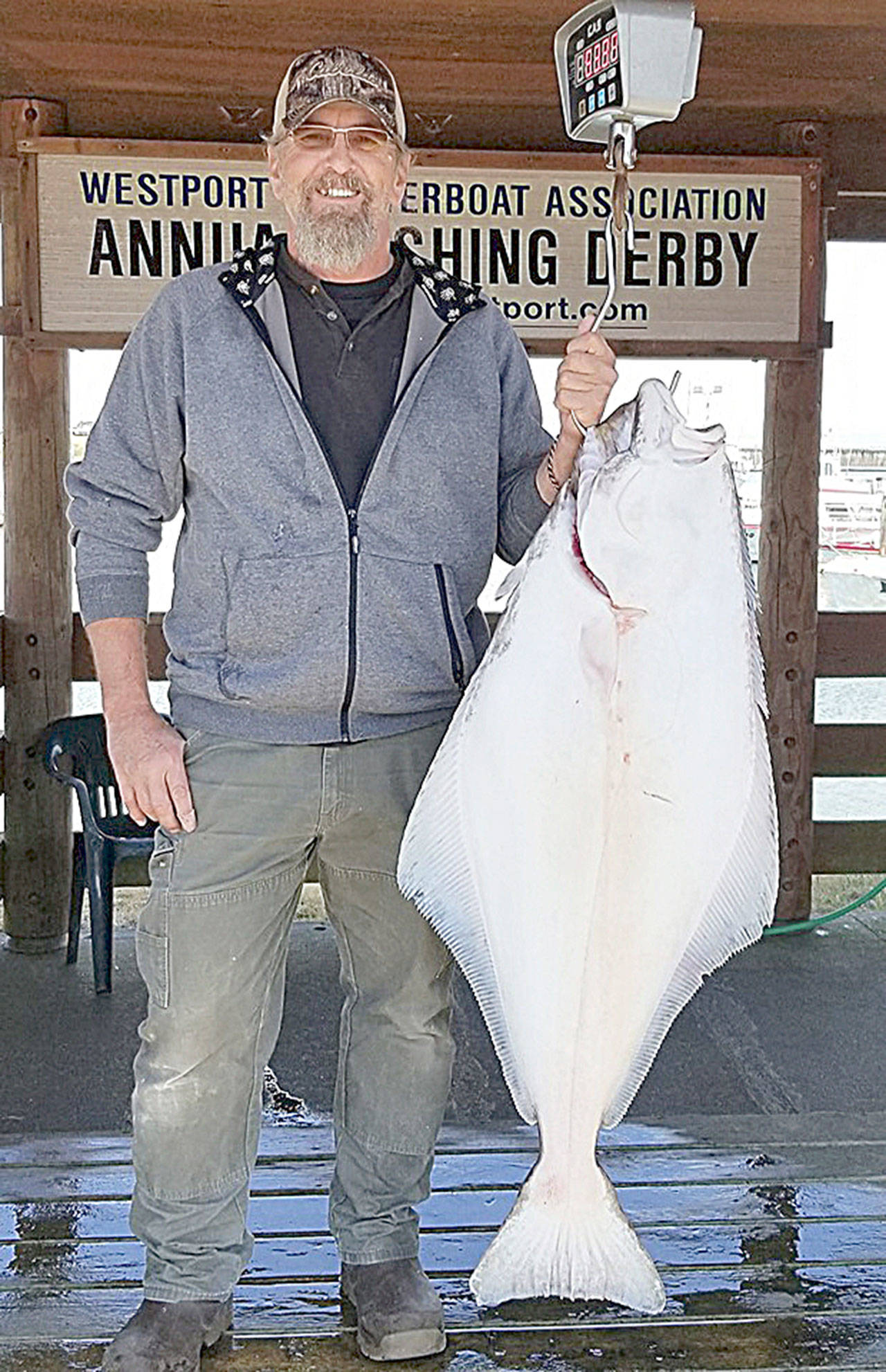COURTESY WESTPORT WEIGHMASTER                                 Lane Glasoe from Burien caught this 51.25-pound halibut on the last Marine Area 2 opener June 20 aboard the <em>Advantage</em>. There is sufficient quota remaining for another recreational halibut opener Saturday, June 29.