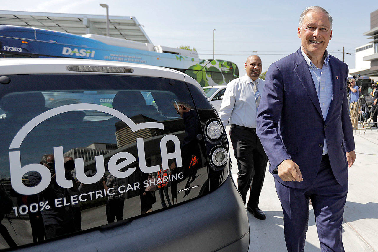 Washington Gov. Jay Inslee, seen campaigning in Los Angeles in May, is attacking the Democratic National Committee for refusing to host a presidential debate focused only on climate change. (Irfan Khan/Los Angeles Times)