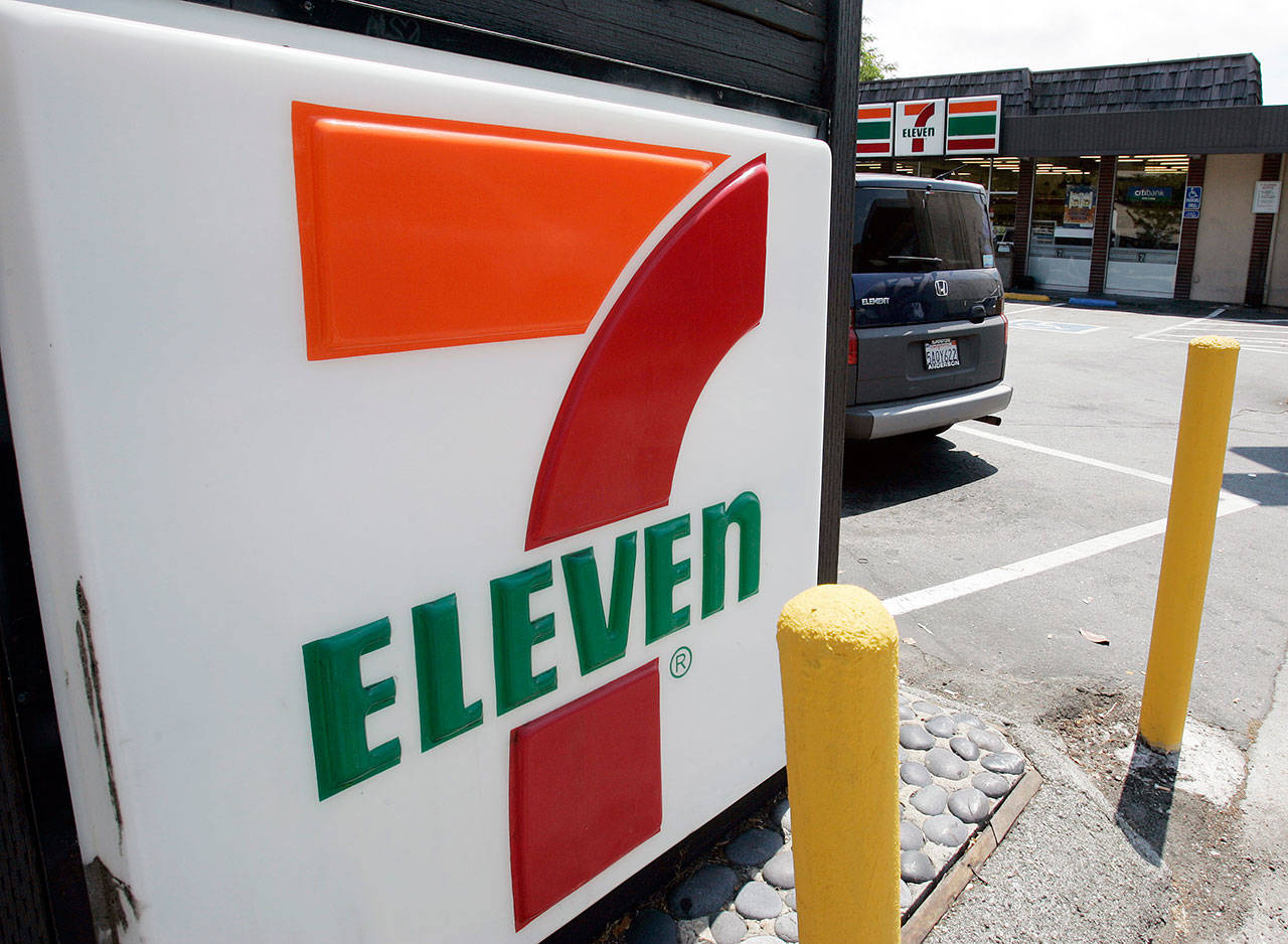7-Eleven is launching a service that lets customers order everything from its trademark frozen drink to a battery charger and have it delivered to a public place like a park or a beach. (AP Photo/Paul Sakuma, File)