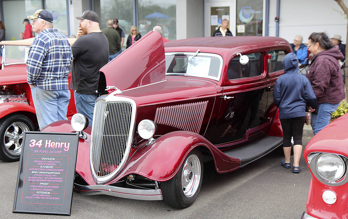 FILE PHOTO                                Classic cars will line Levee Street in Hoquiam Saturday for the annual Hoquiam Push Rods Riverside Run Revival car show. Last year, this 1934 Ford Henry owned by Joe and Beth Pavletich of Montesano was among the dozens of entries.