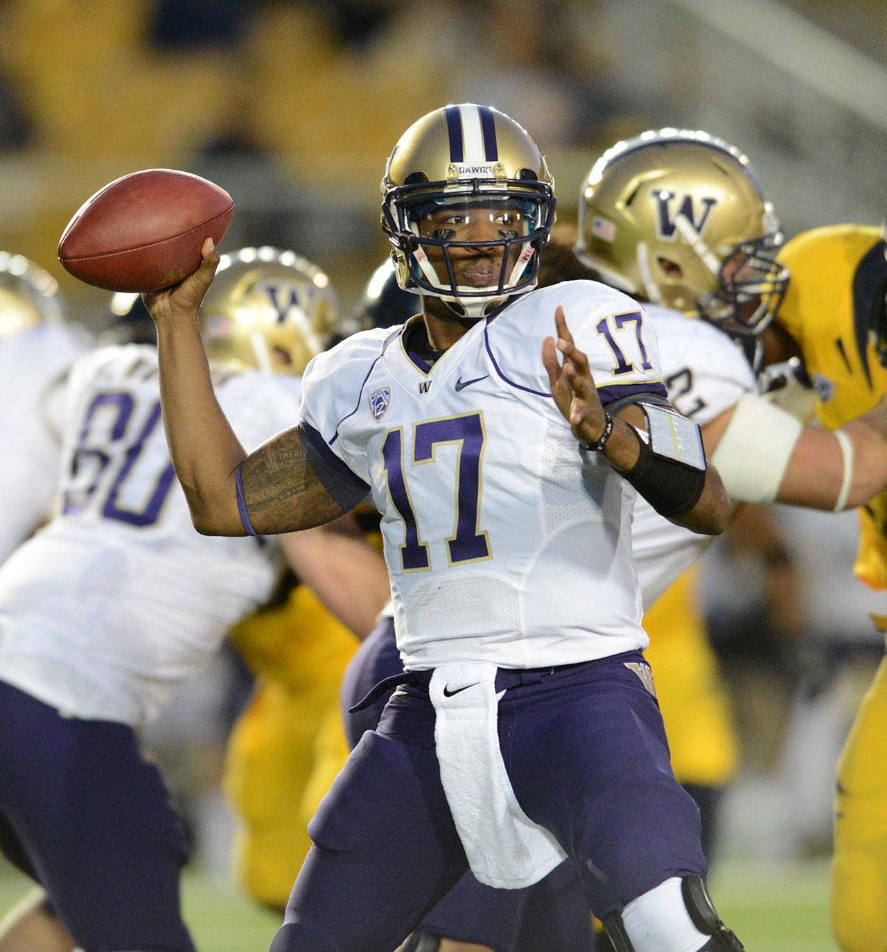 Washington quarterback Keith Price (17) passes the ball to an open receiver in the first quarter against California at Memorial Stadium in Berkeley, California, on Friday, November 2, 2012. (Doug Duran/Contra Costa Times/MCT)