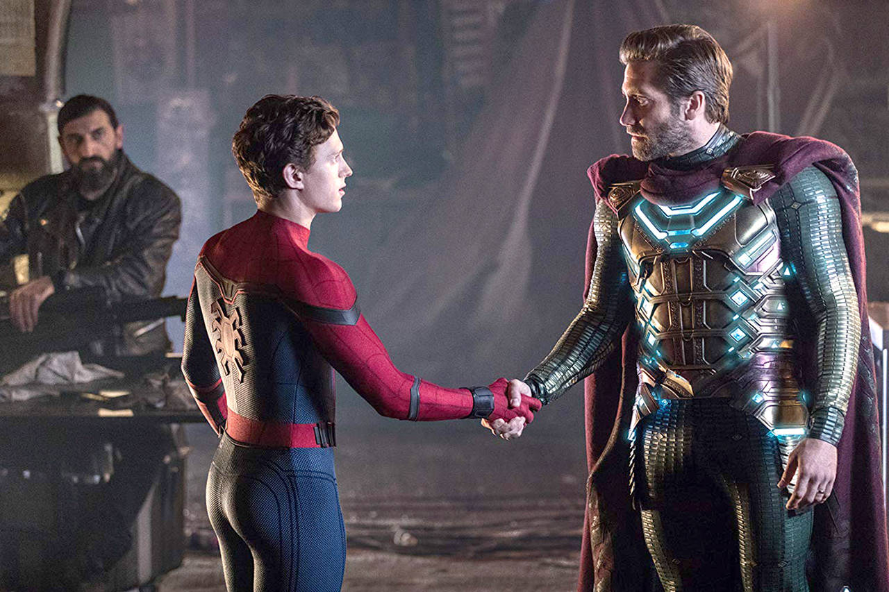 Marvel Studios                                Spider-Man (Tom Holland), center, talks with Mysterio (Jake Gyllenhaal), right, in “Spider-Man: Far from Home.”