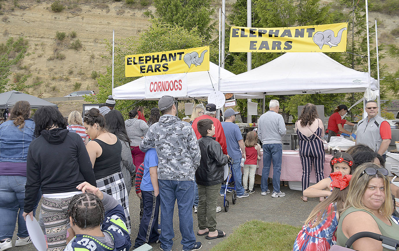 DAN HAMMOCK | GRAYS HARBOR NEWS GROUP                                Elephant ears, kettle corn, corn dogs and snow cones were offered by vendors at the Aberdeen Splash Festival Thursday in Morrison Riverfront Park.