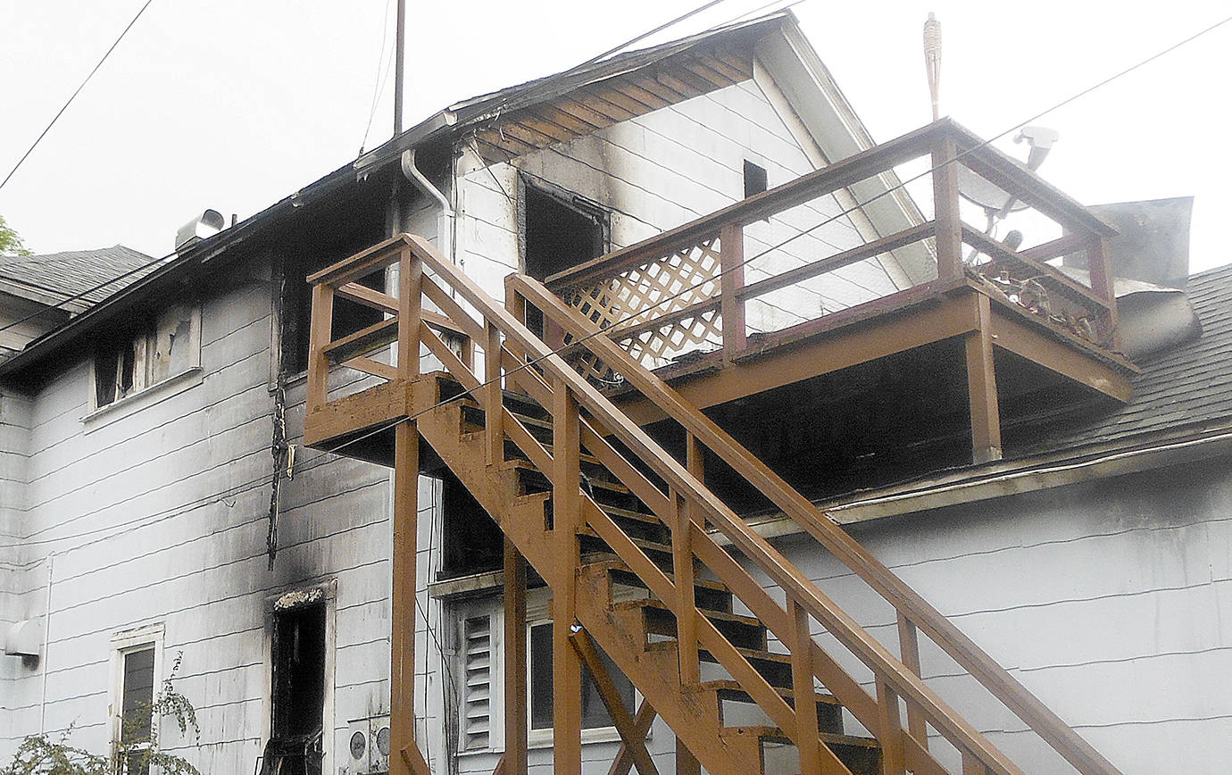 DAN HAMMOCK | GRAYS HARBOR NEWS GROUP                                A fire Thursday morning caused more than $220,000 in damage to a residence in the 100 block of 4th Street in Aberdeen.