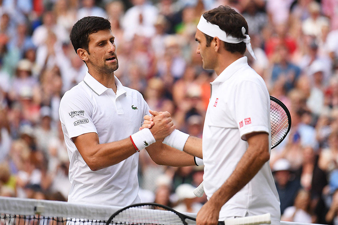 Wimbledon: Novak Djokovic wins his fifth such title in epic defeat of Roger Federer