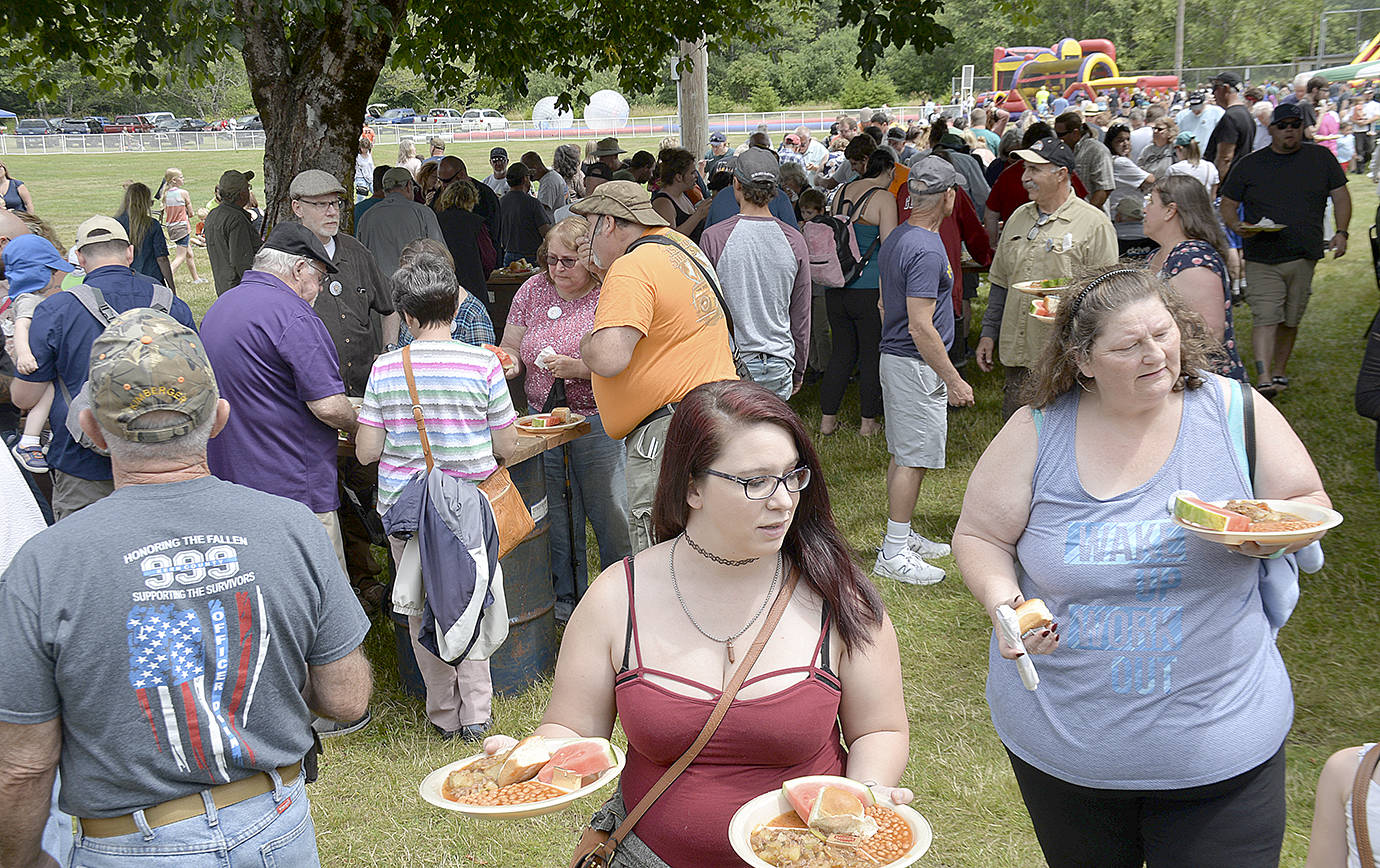 DAN HAMMOCK | GRAYS HARBOR NEWS GROUP                                The lack of bear meat in the stew didn’t stop hundreds from nabbing a plateful at the McCleary Bear Festival Saturday.