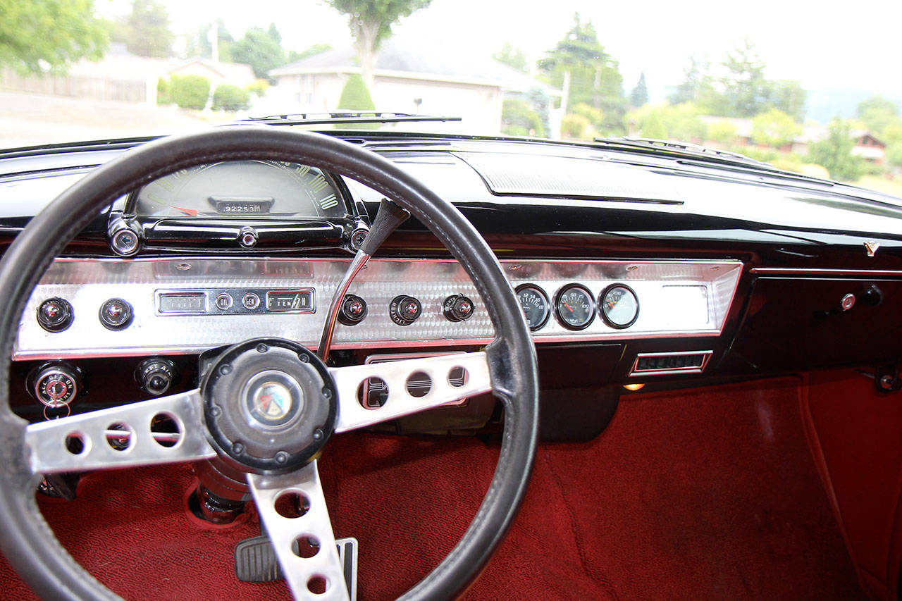 Today’s drivers might not know what to make of the knobs and dials on the dashboard of Denny Foster’s 1954 Ford Sunliner.