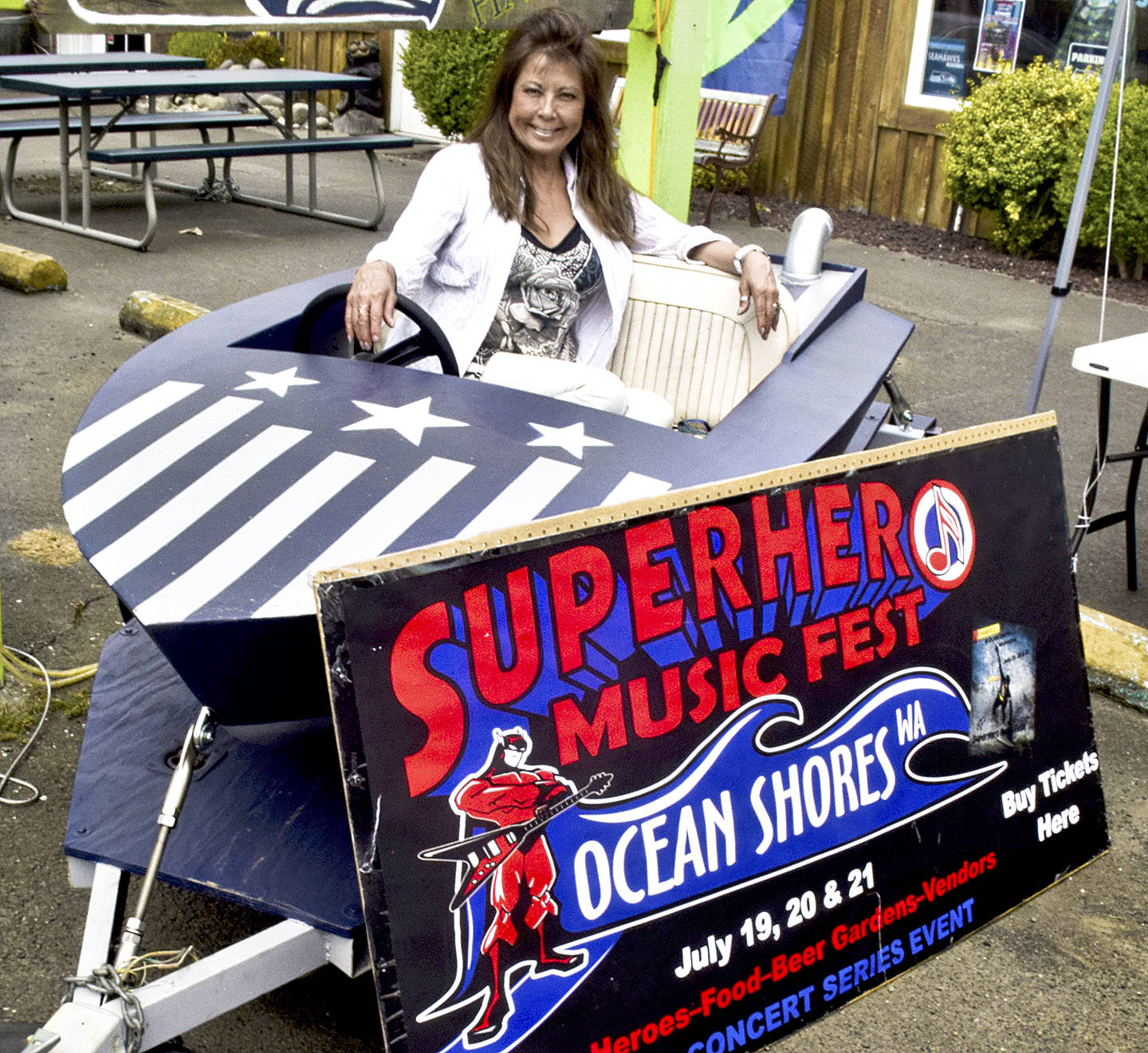 Scott D. Johnston | for Grays Harbor News Group                                Ocean Shores business owner and rookie concert promoter June Bongirno prepares for the Superhero Music Fest to be held Friday through Sunday at the Ocean Shores Convention Center.