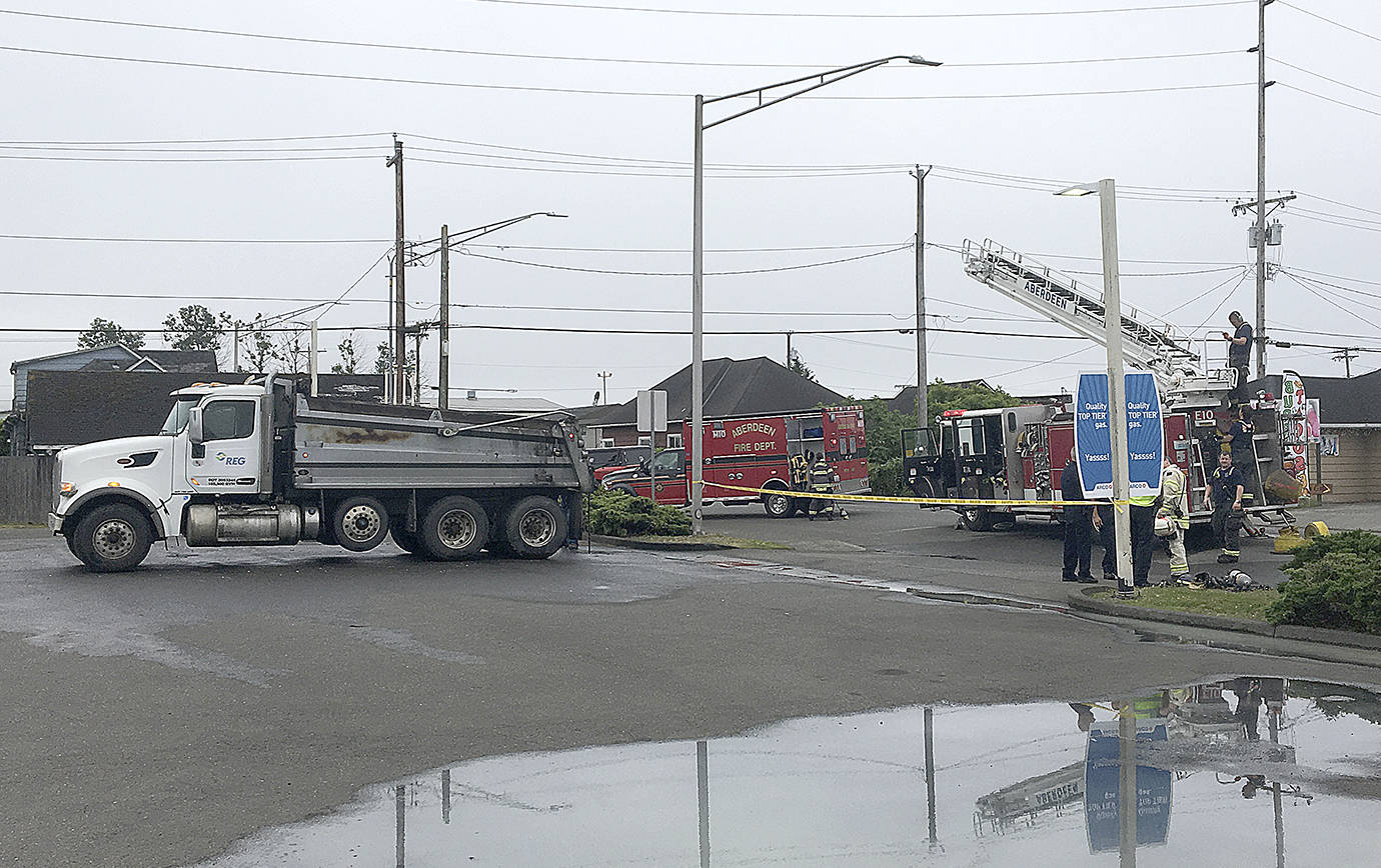 DAN HAMMOCK | GRAYS HARBOR NEWS GROUP                                A load of oily waste rags from Renewable Energy Group Inc. at the Port of Grays Harbor caught fire in the back of a dump truck near the AM/PM at West Heron Street and South Park Street Friday morning. South Park was blocked off for a short time while the fire was contained.