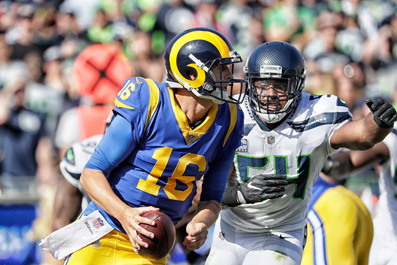 Seahawks linebacker Bobby Wagner pressures Los Angeles Rams quarterback Jared Goff. (Robert Gauthier/Los Angeles Times)