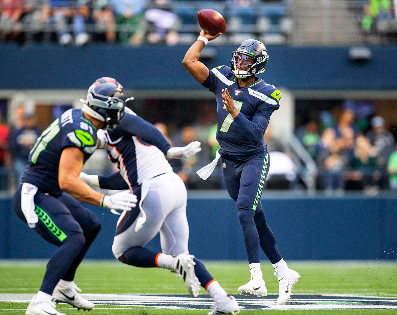 Seattle Seahawks quarterback Geno Smith (7) gets enough protection to throw a first-quarter pass against the Denver Broncos during a preseason game at Century Link Field in Seattle on Thursday, Aug. 8, 2019. (Dean Rutz/Seattle Times/TNS)