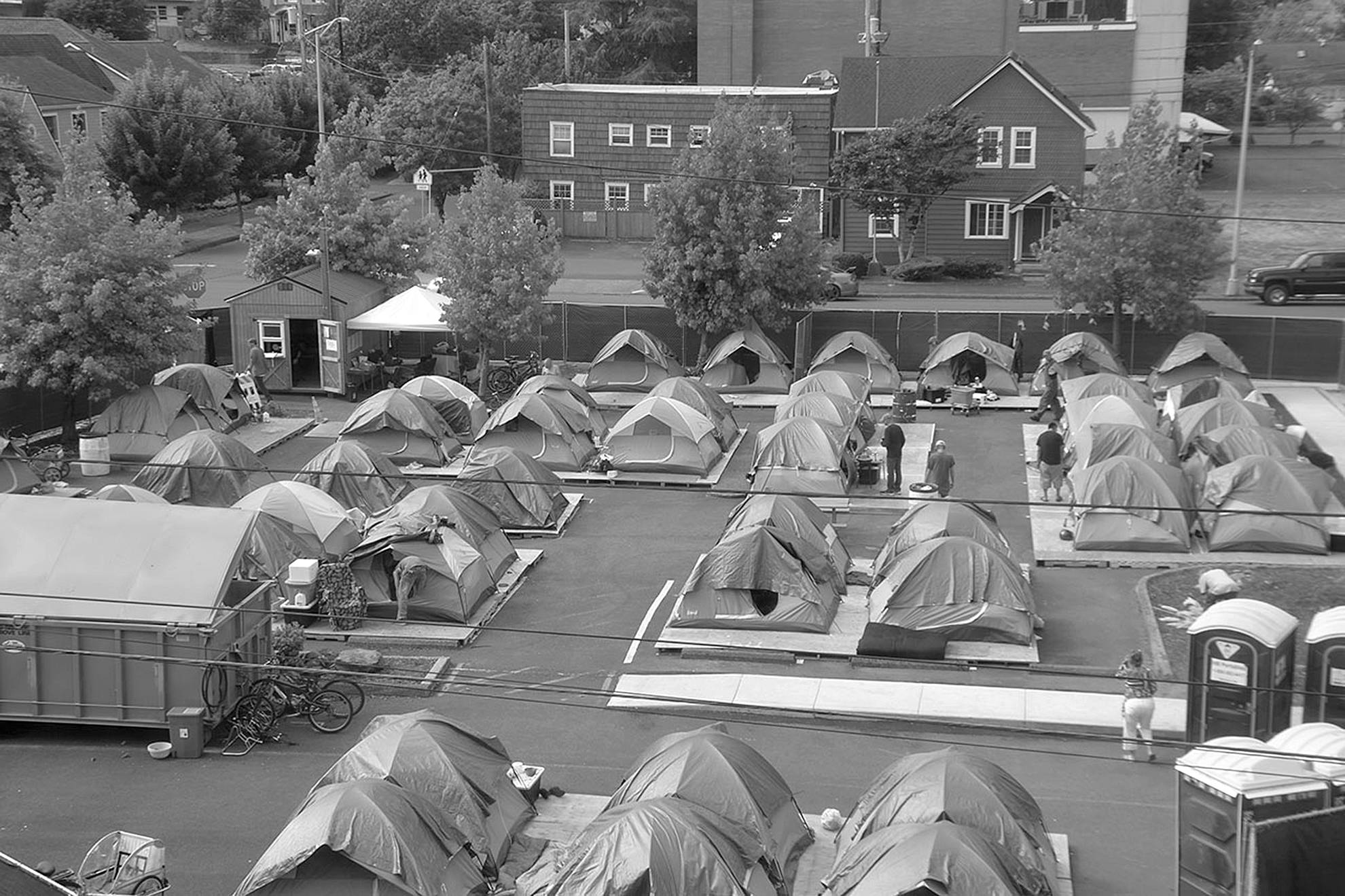 Louis Krauss | Grays Harbor News Group                                 A view from Aberdeen City Hall of the temporary shelter, which is currently filled with 48 tents and over 60 people.