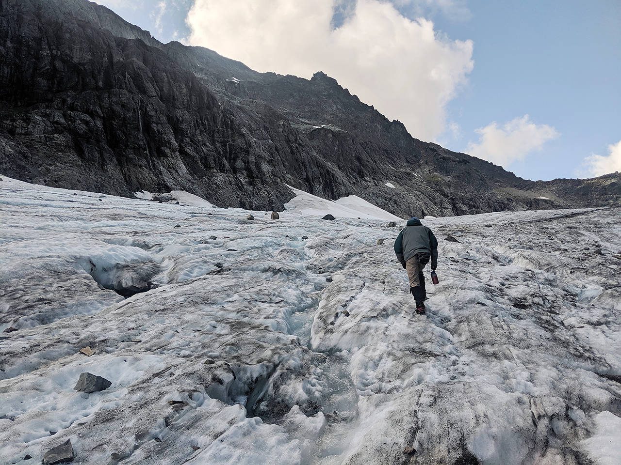 <strong></strong>With crampons strapped on and ice ax in hand, glaciologist Mauri Pelto makes his way up Columbia Glacier. (Zachariah Bryan / The Herald)